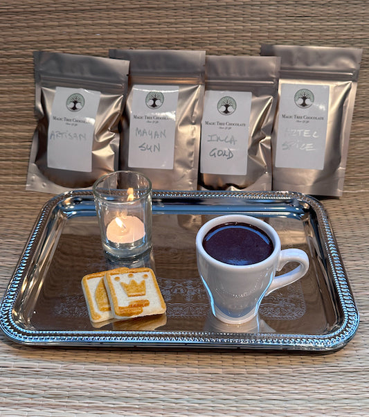 Our Four Premium Drinking Chocolates, White Demitasse Ceramic Cup and silver metal tray.